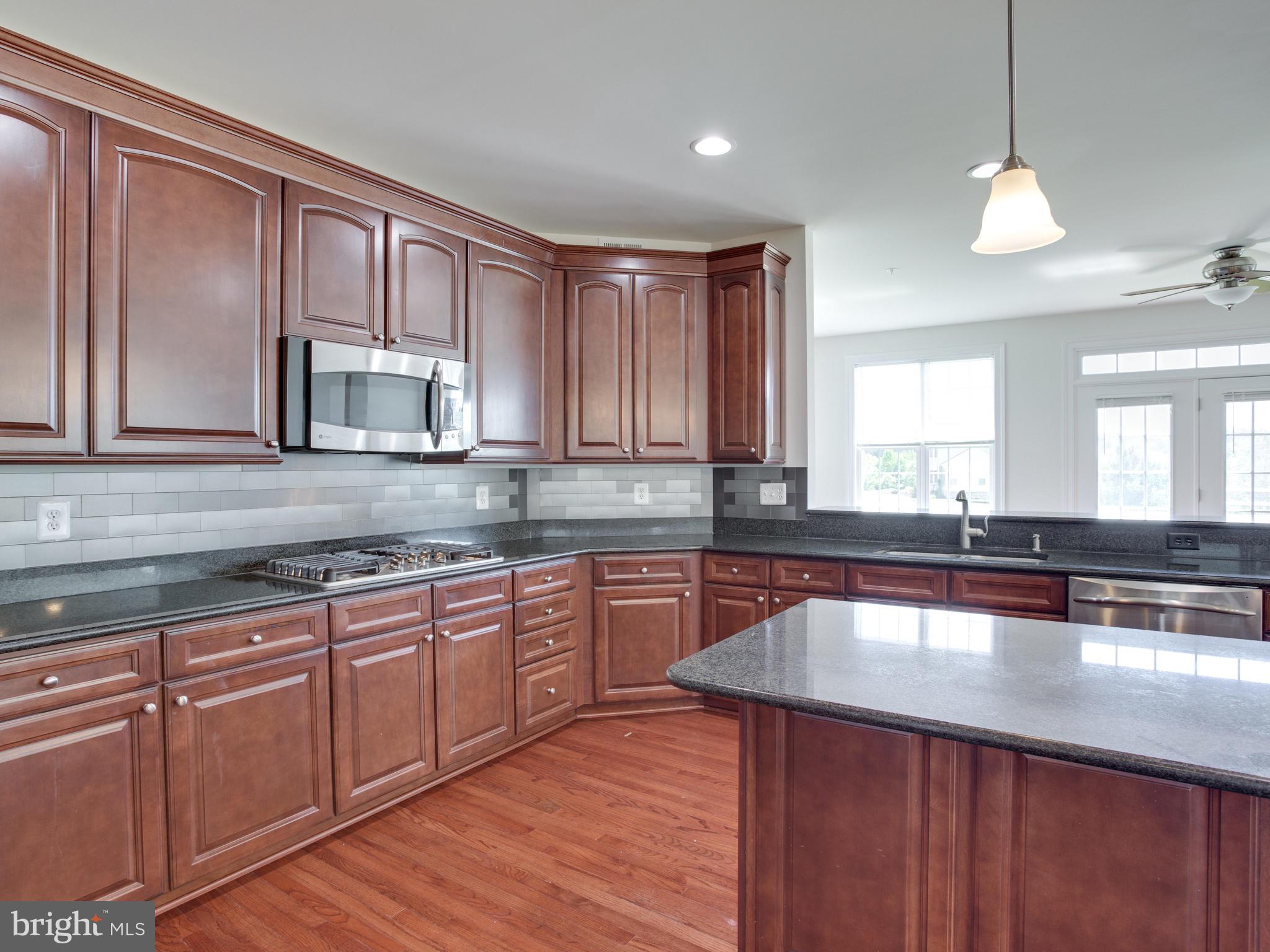 13001 Contee Manor Road Bowie, MD 20721 - Photo 14 of 43 Granite Counter Tops Handsome Backsplash.