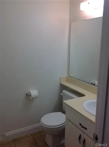 a bathroom with a shower and a toilet