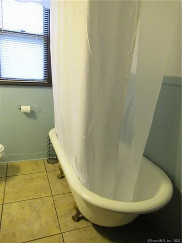 a bathroom with a sink and a bathtub