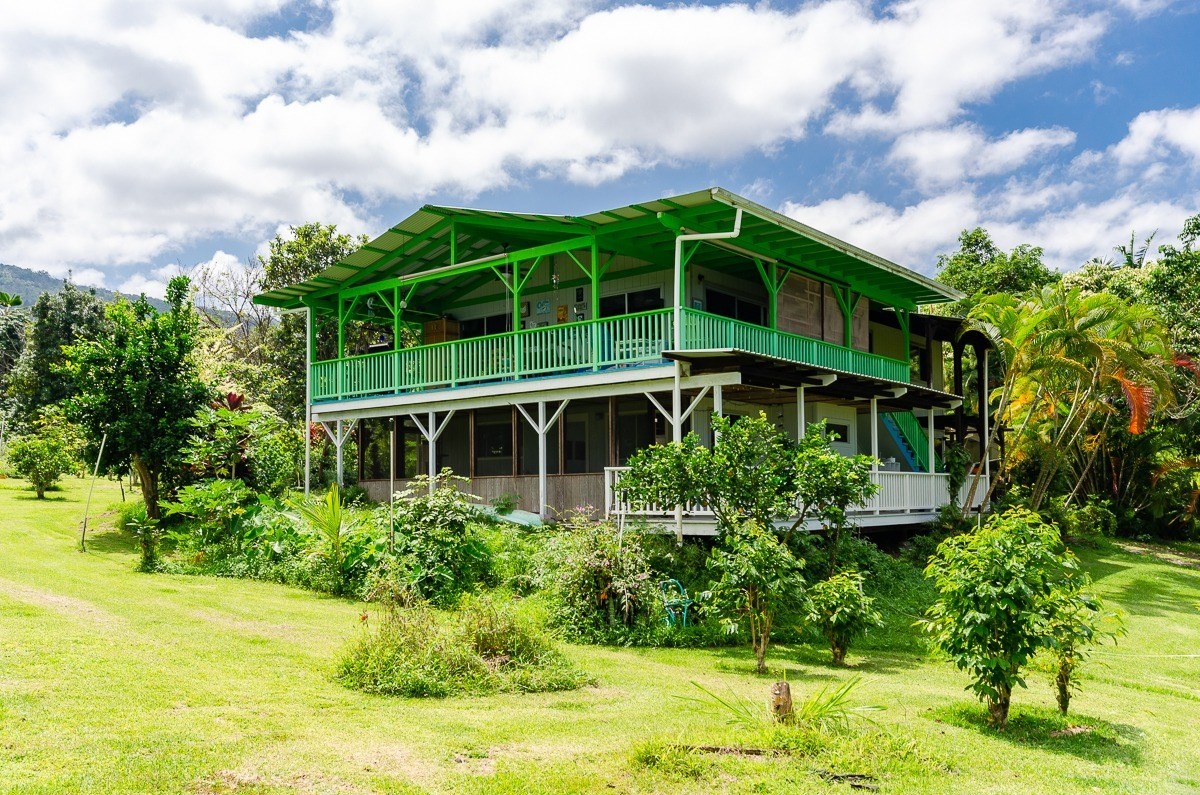 83-5434-C Middle Keei Road Captain Cook, HI 96704 - Photo 17 of 30 a view of a garden with a building in the background