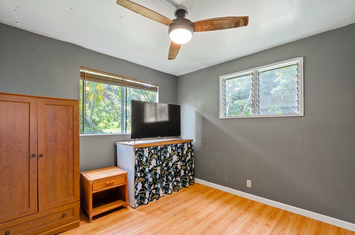 83-5434-C Middle Keei Road Captain Cook, HI 96704 - Photo 25 of 30 a livingroom with window and furniture