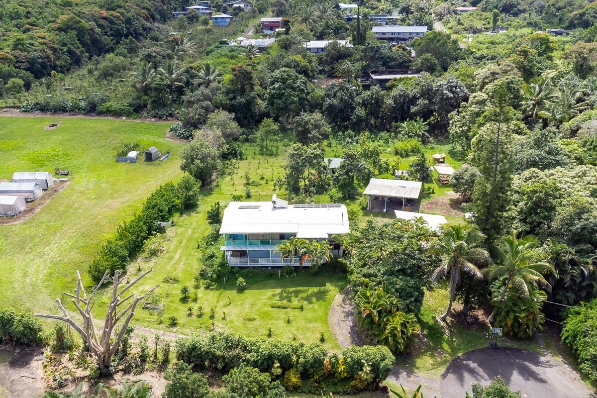 83-5434-C Middle Keei Road Captain Cook, HI 96704 - Photo 30 of 30 an aerial view of a house with a yard basket ball court and outdoor seating