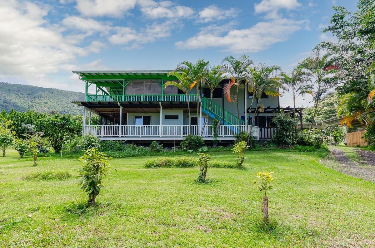 83-5434-C Middle Keei Road Captain Cook, HI 96704 - Photo 4 of 30 a backyard of a house with lots of green space