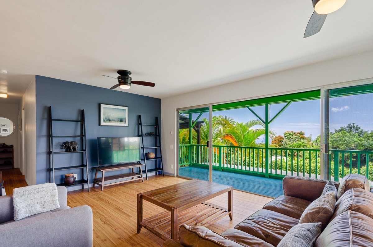 83-5434-C Middle Keei Road Captain Cook, HI 96704 - Photo 6 of 30 a living room with furniture and a flat screen tv