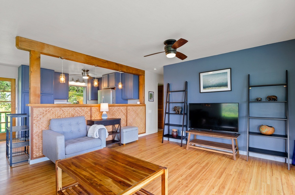 83-5434-C Middle Keei Road Captain Cook, HI 96704 - Photo 7 of 30 a living room with furniture and a flat screen tv