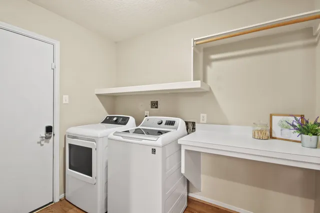 a utility room with dryer and washer