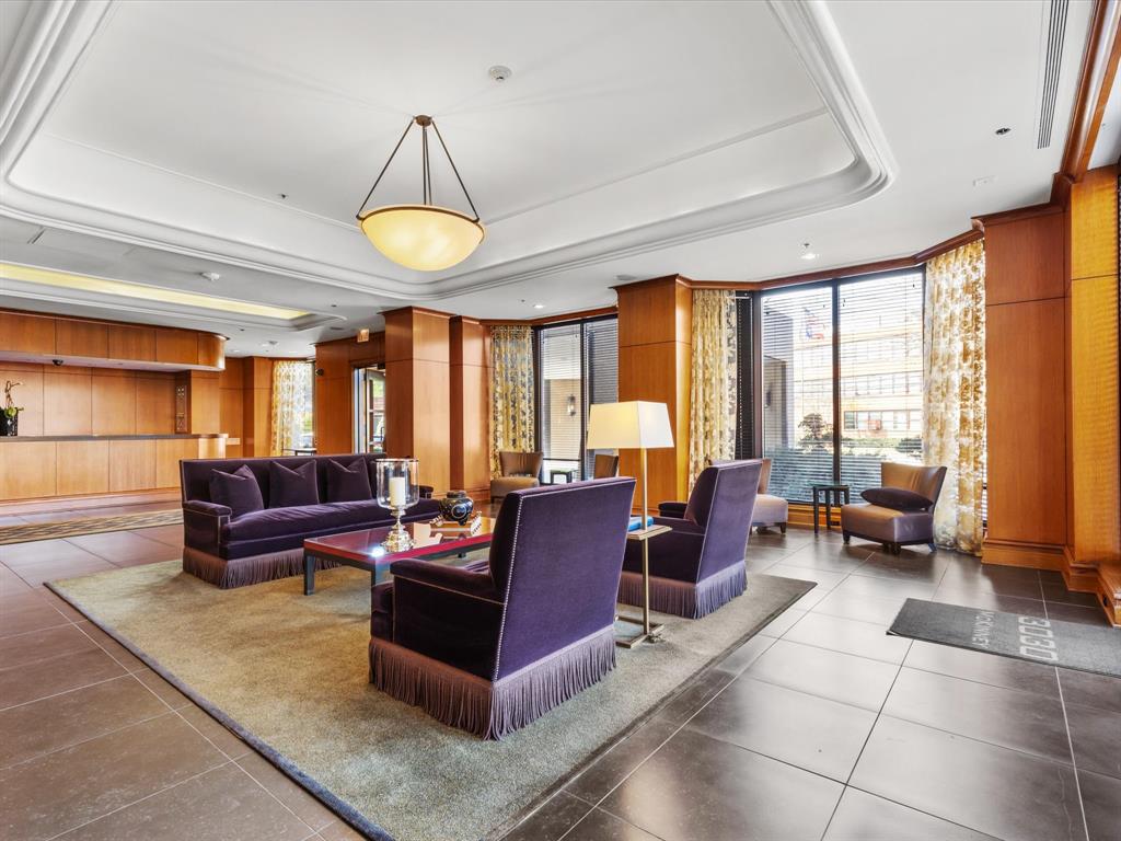 3030 McKinney Avenue, Unit 2301 Dallas, TX 75204 - Photo 26 of 34 a living room with furniture and a large window