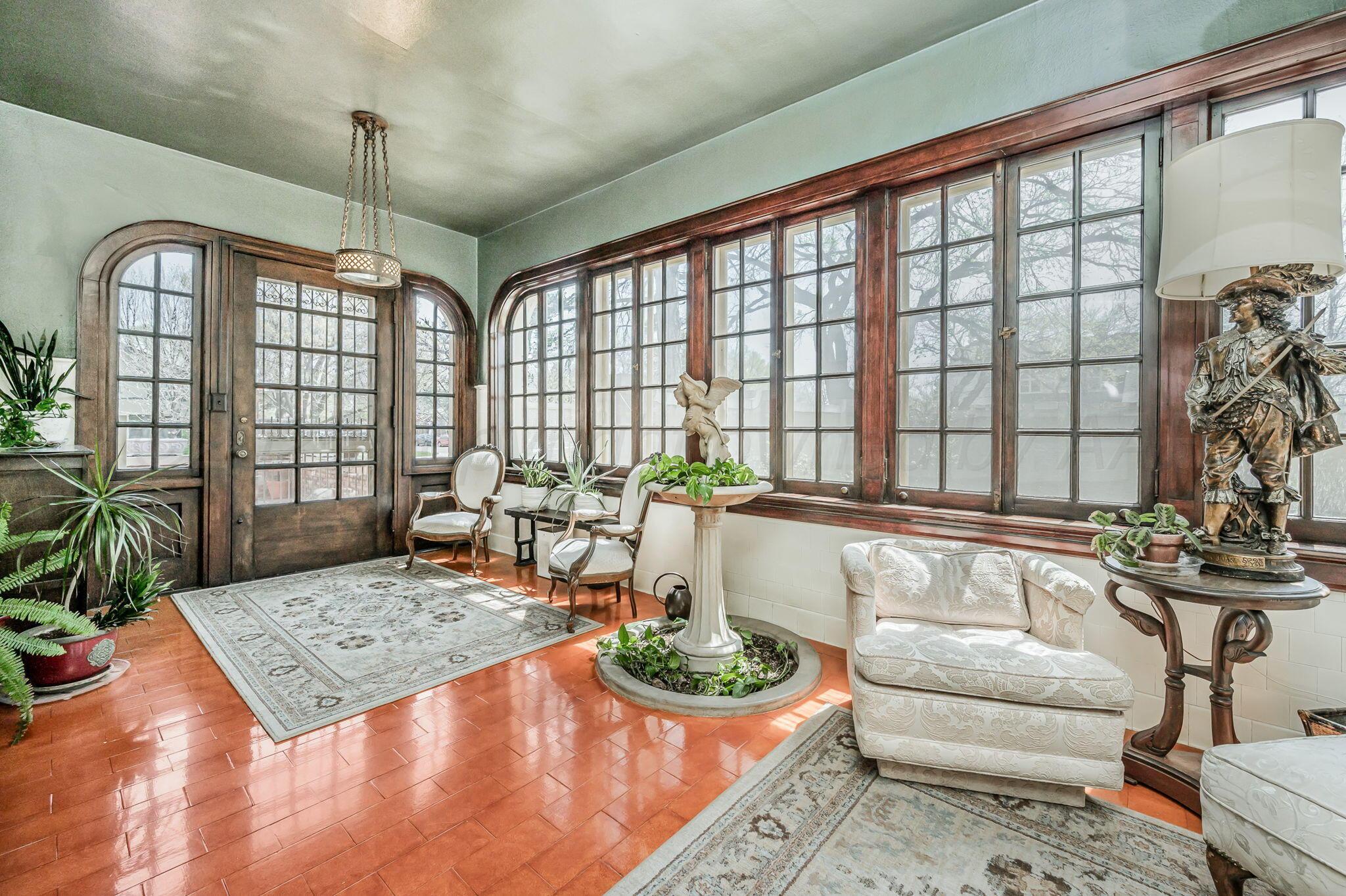 1620 South Tyler Street Amarillo, TX 79102 - Photo 13 of 66 a living room with furniture and a large window