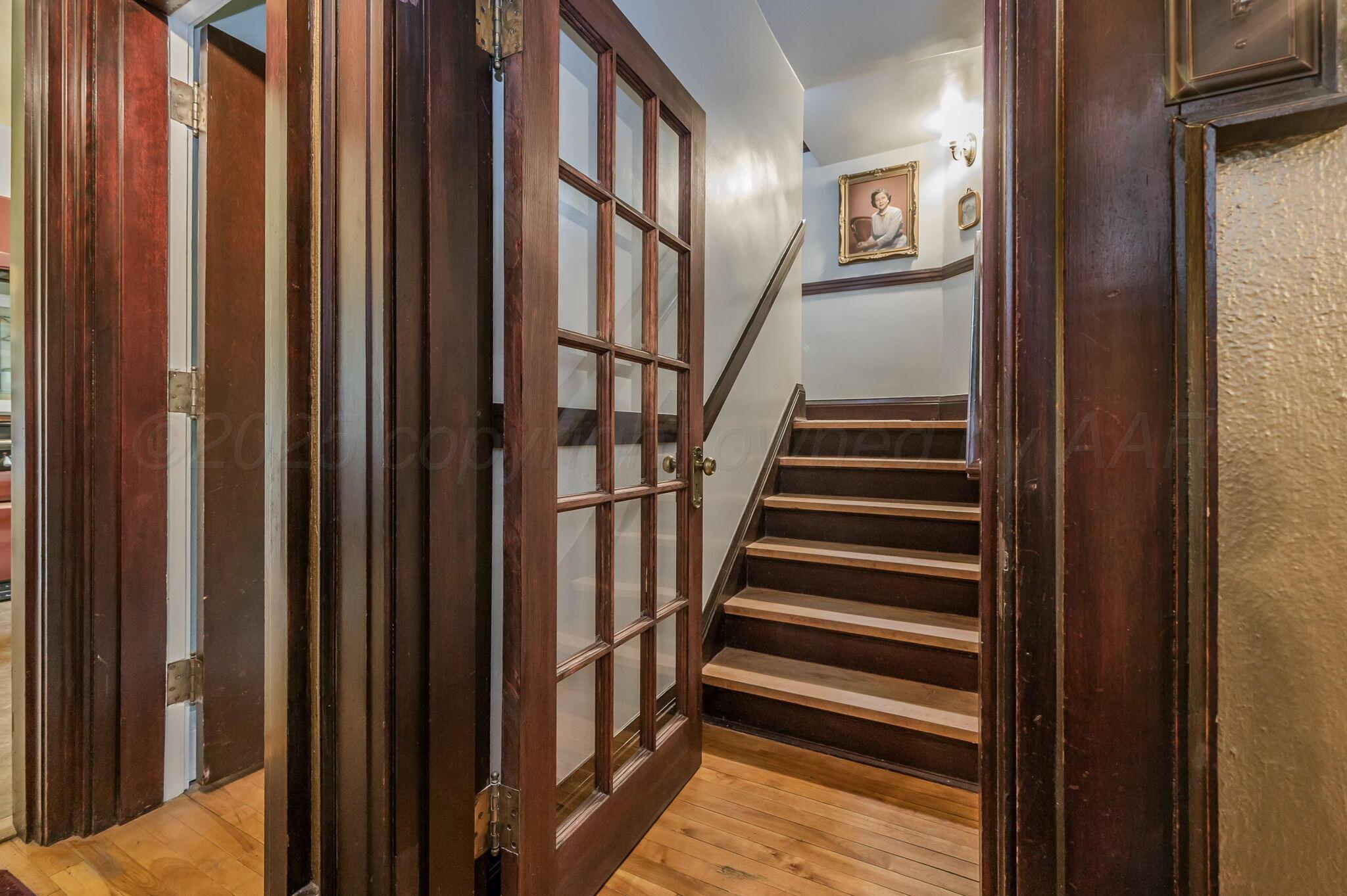 1620 South Tyler Street Amarillo, TX 79102 - Photo 23 of 66 a view of entryway and hall with wooden floor