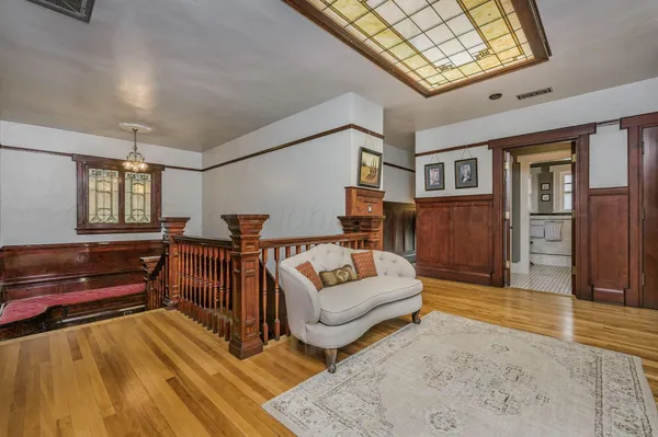 a view of walk in closet with clothes