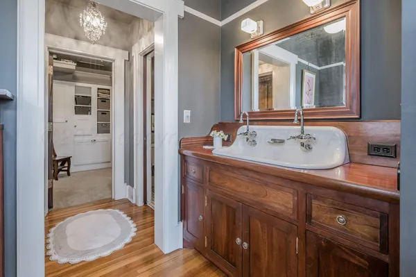 a view of a chairs and table in the backyard