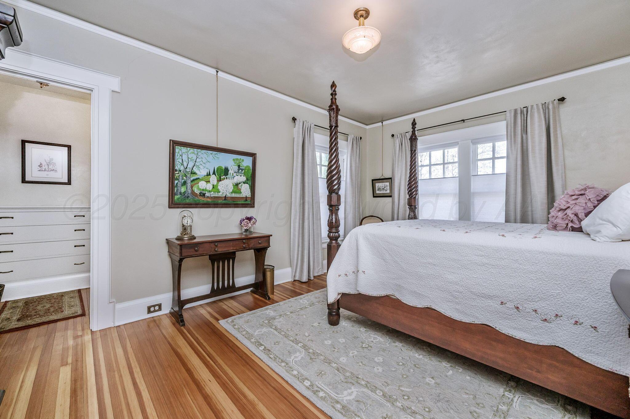 1620 South Tyler Street Amarillo, TX 79102 - Photo 38 of 66 a bedroom with a bed and a table