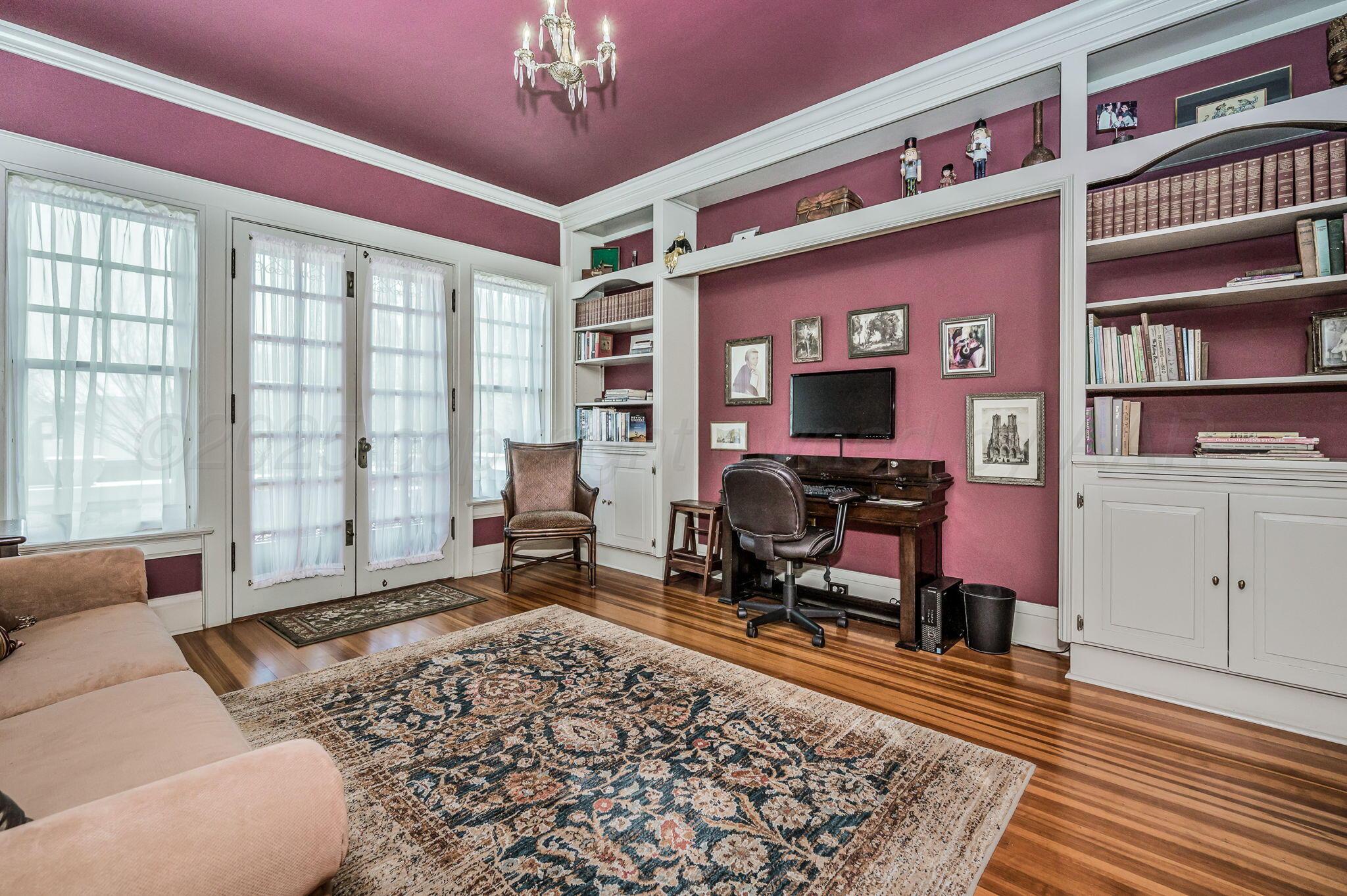 1620 South Tyler Street Amarillo, TX 79102 - Photo 46 of 66 a living room with furniture a rug and a window