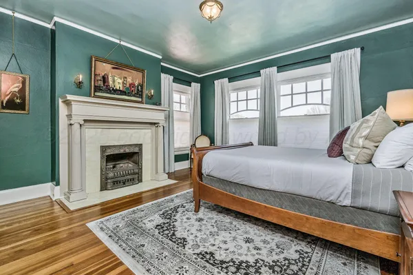 a view of a patio with table and chairs and potted plants