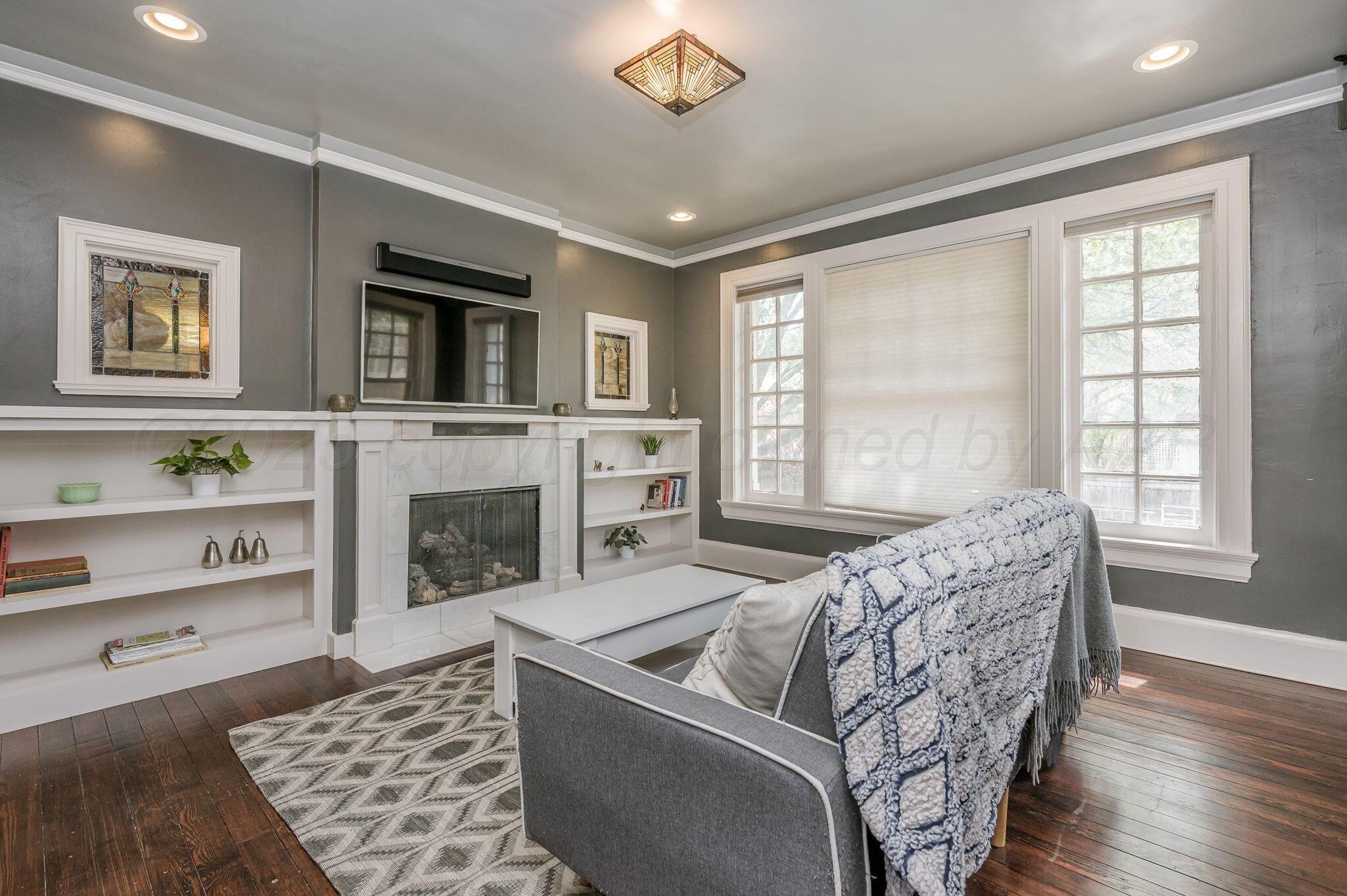 1620 South Tyler Street Amarillo, TX 79102 - Photo 55 of 66 a living room with furniture and a fireplace