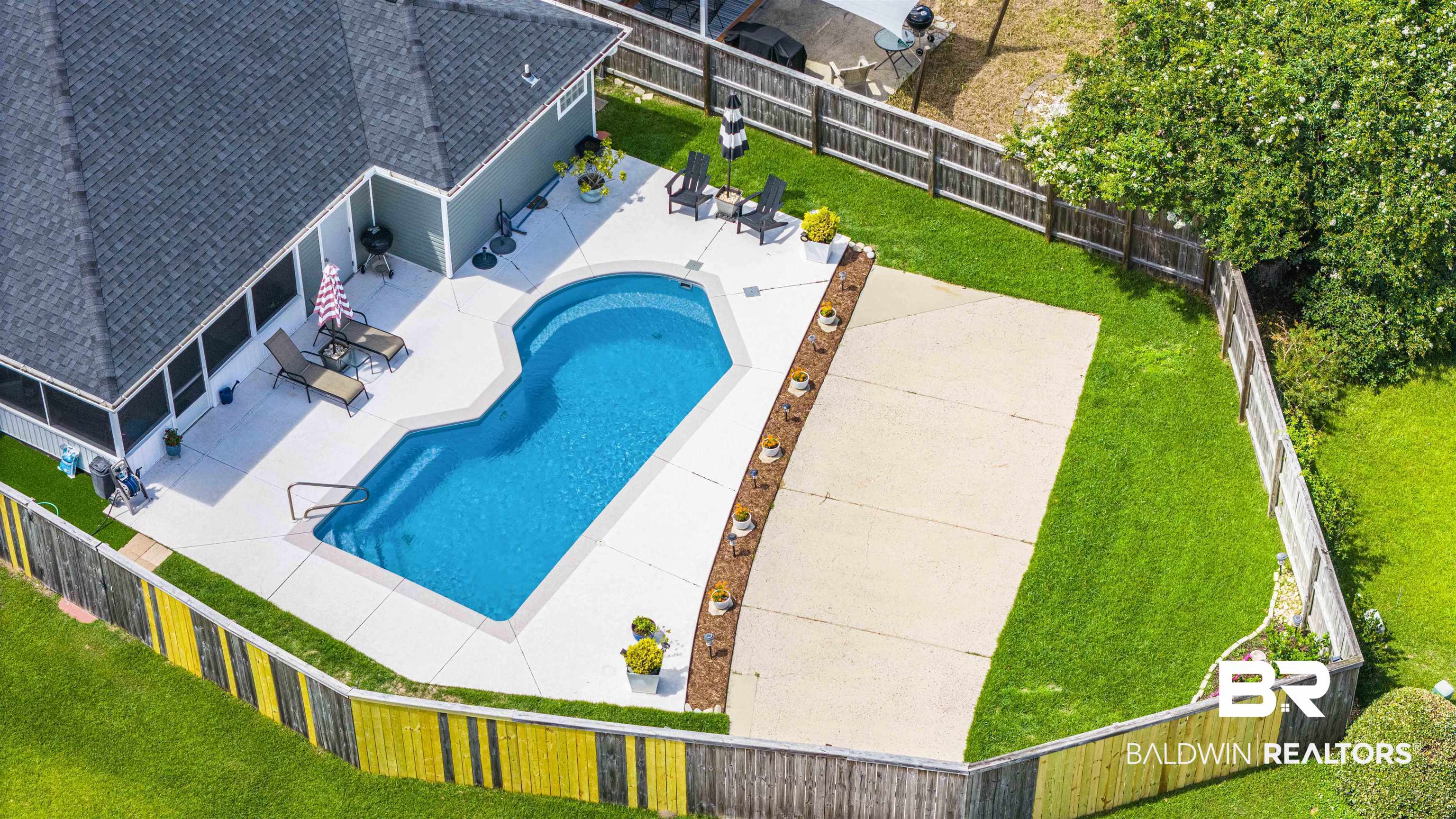 4620 Pine Boulevard Orange Beach, AL 36561 - Photo 34 of 49 Aerial view of property and surrounding area featuring a pool