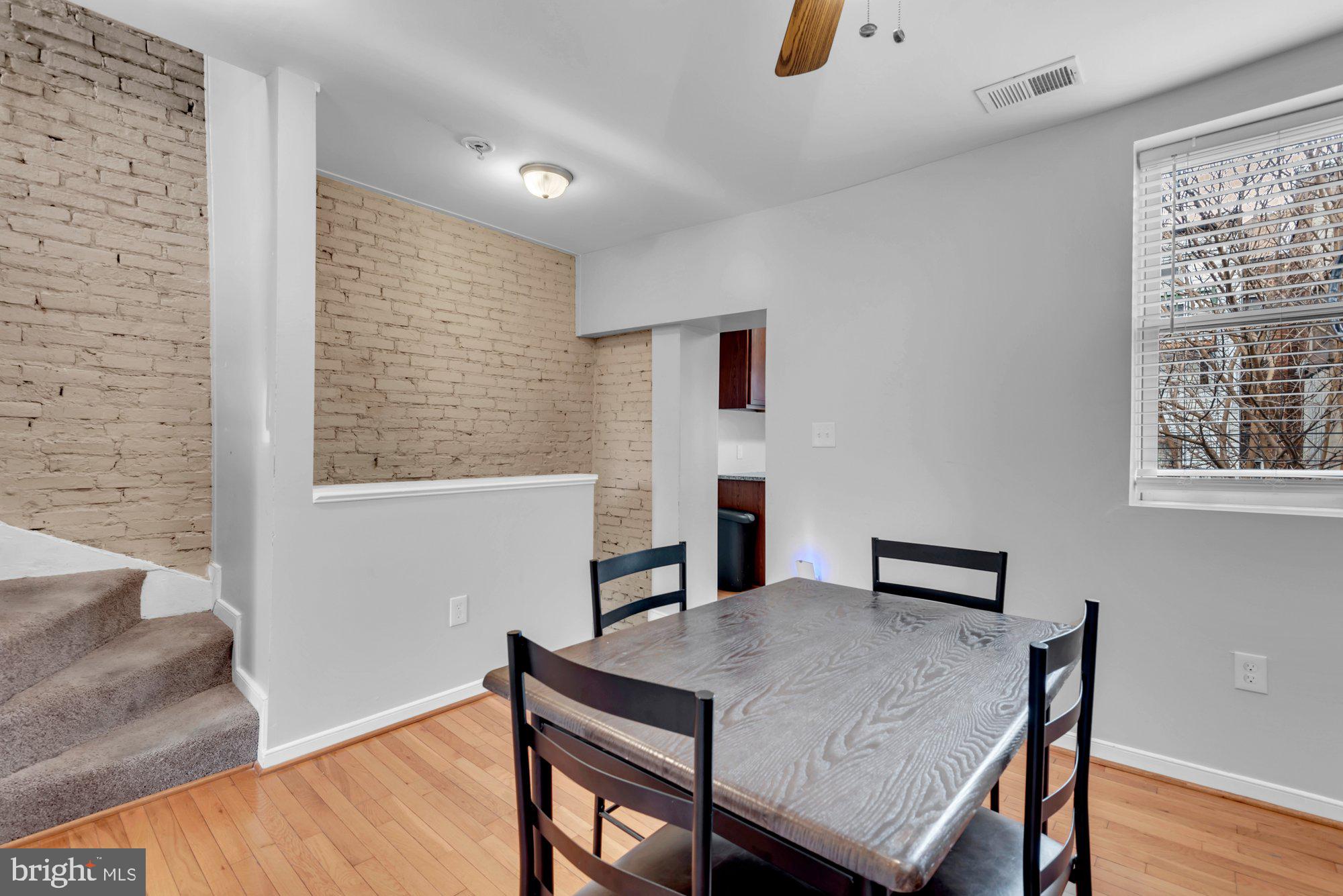 210 West Read Street Baltimore, MD 21201 - Photo 16 of 26 a workspace with furniture and window