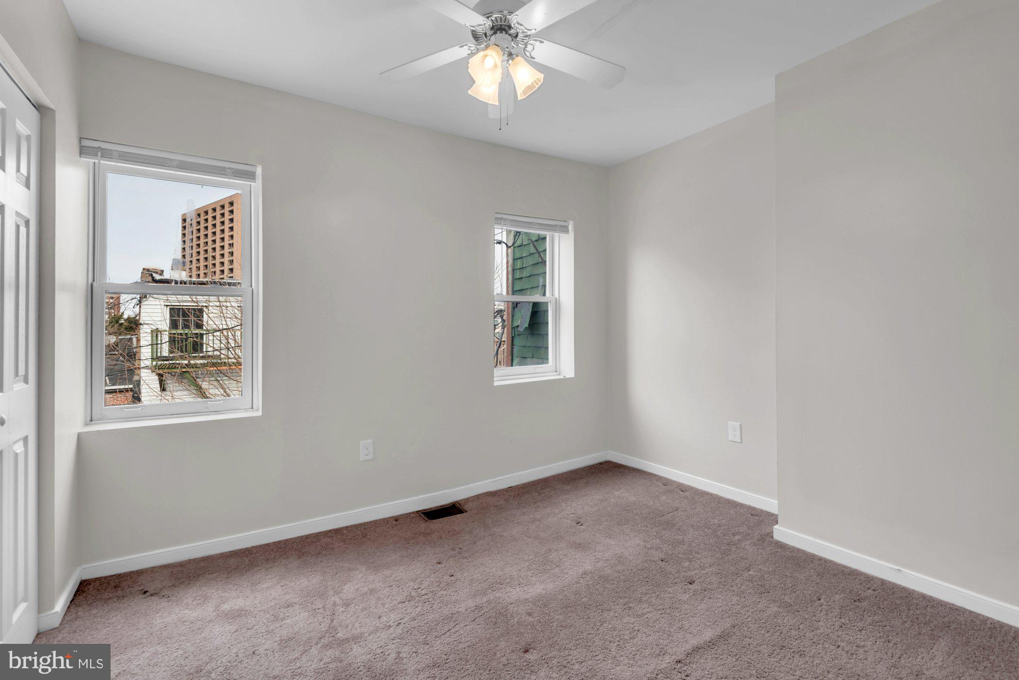210 West Read Street Baltimore, MD 21201 - Photo 19 of 26 a view of an empty room with a window