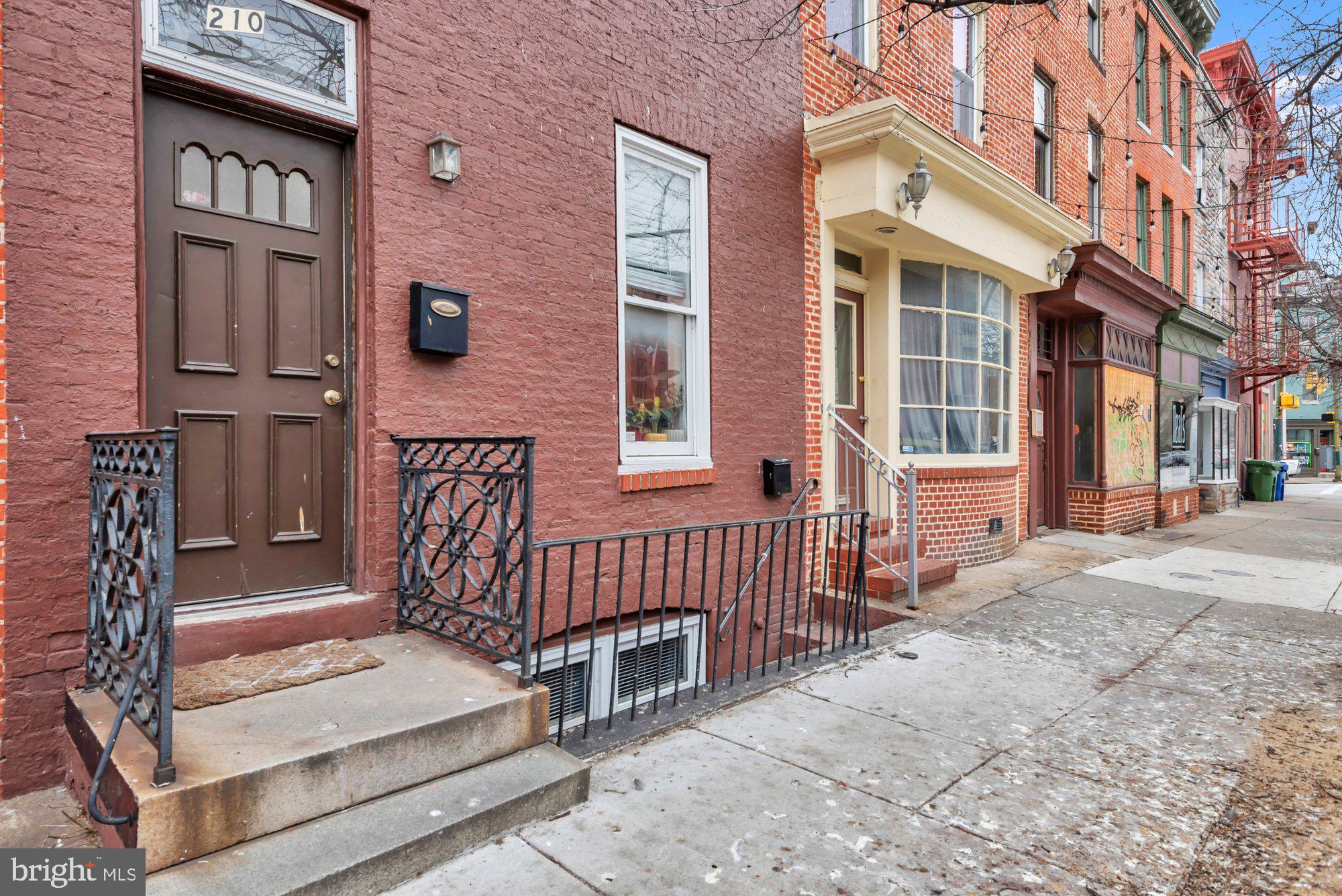 210 West Read Street Baltimore, MD 21201 - Photo 2 of 26 a view of a brick building with many windows