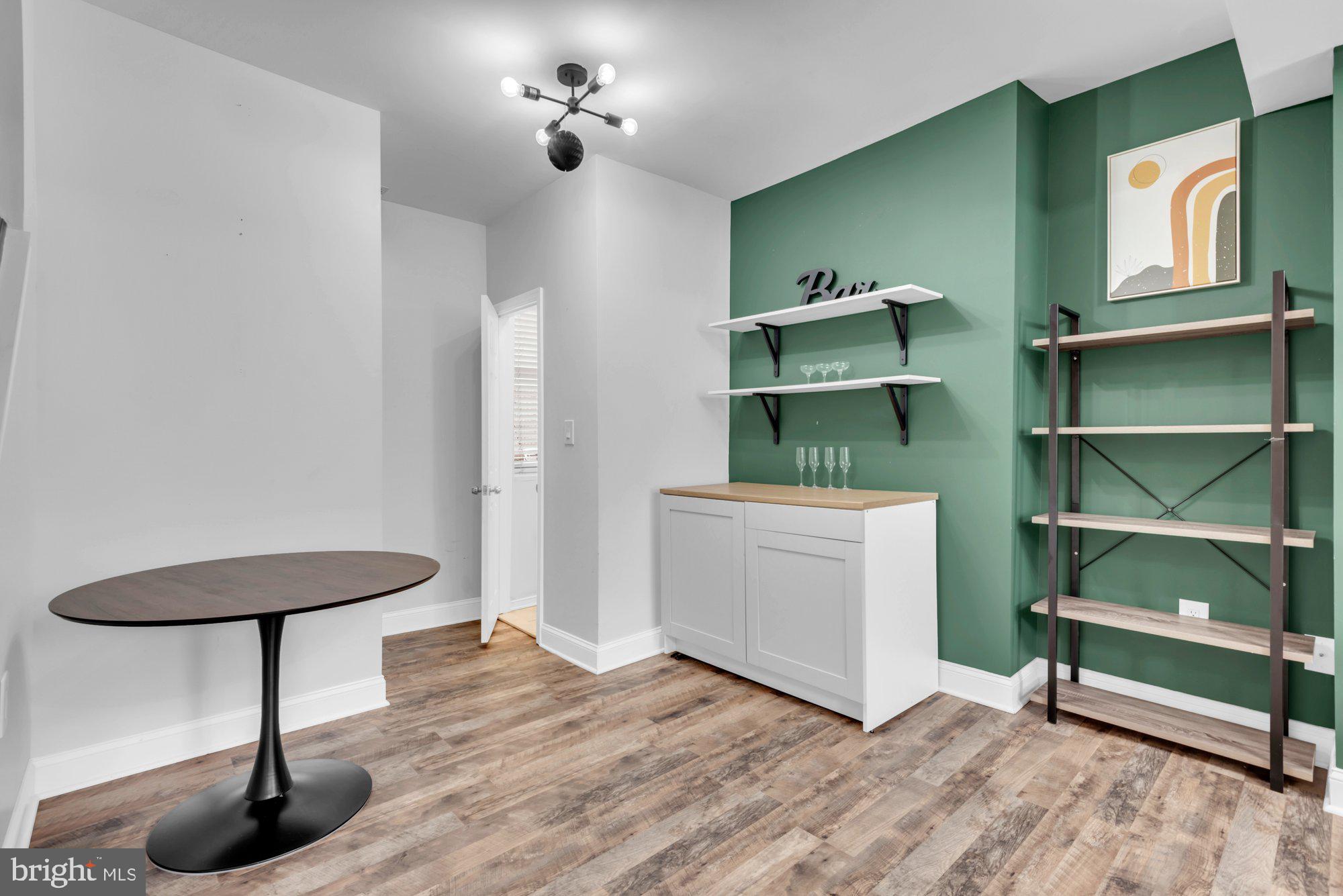 210 West Read Street Baltimore, MD 21201 - Photo 9 of 26 a room with cabinets and wooden floor