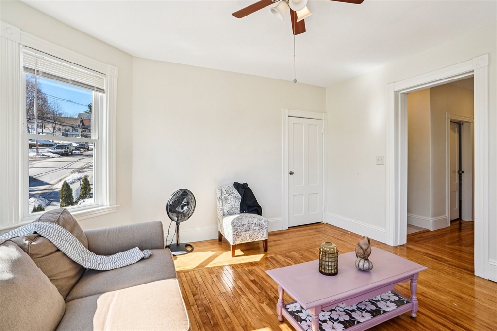 50 Whipple Street Worcester, MA 01607 - Photo 17 of 30 a living room with furniture and wooden floor