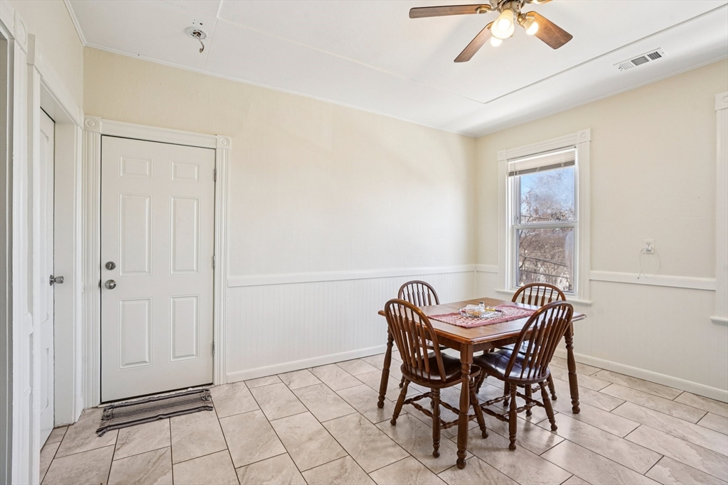 50 Whipple Street Worcester, MA 01607 - Photo 18 of 30 a view of a dining room with furniture and chandelier