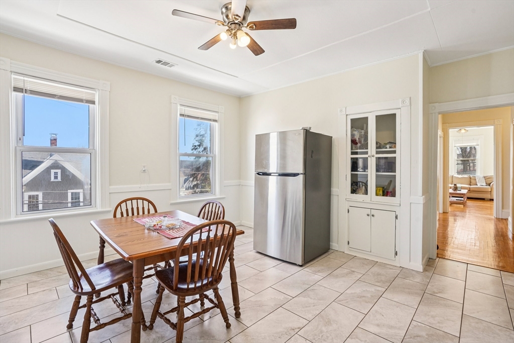 50 Whipple Street Worcester, MA 01607 - Photo 19 of 30 a dining room with furniture and a window