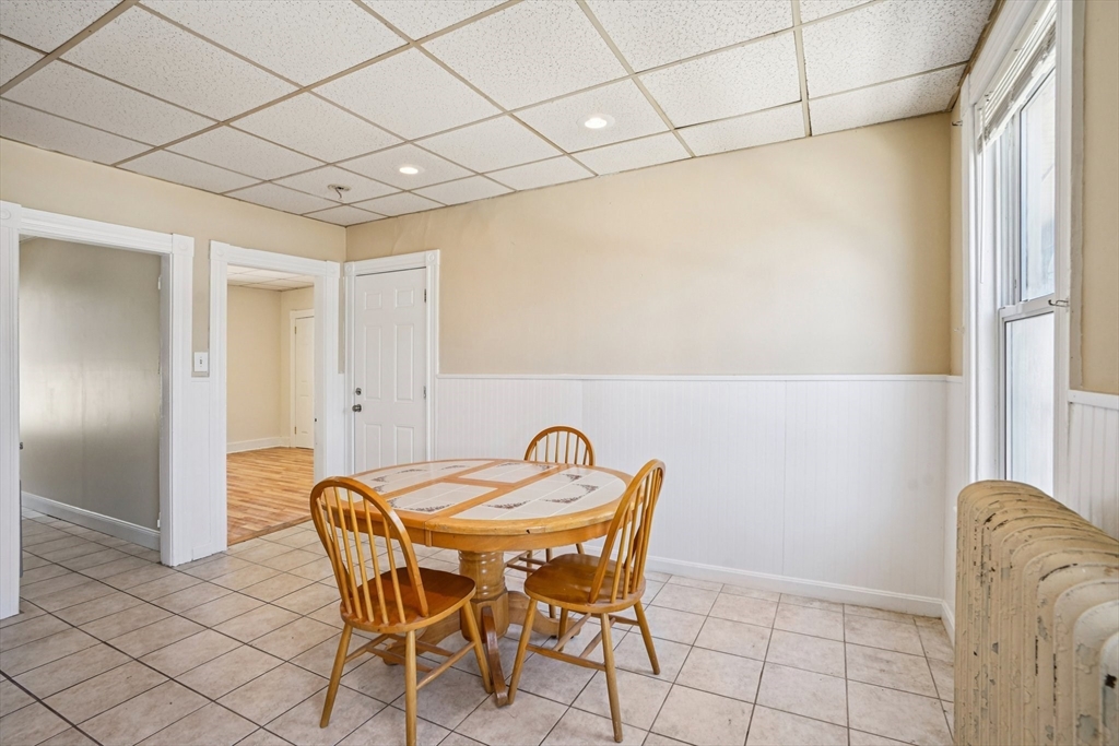 50 Whipple Street Worcester, MA 01607 - Photo 10 of 30 a view of a dining room with furniture and chandelier