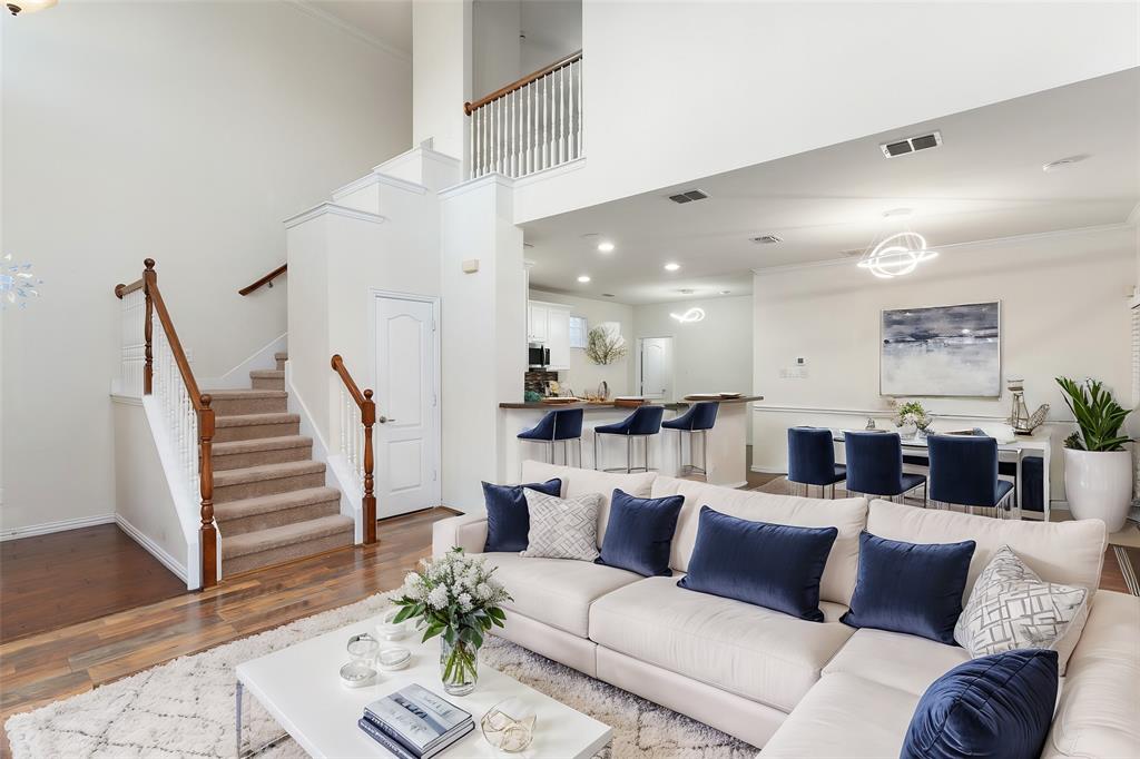 7113 Occidental Road Plano, TX 75025 - Photo 6 of 35 a living room with furniture and wooden floor