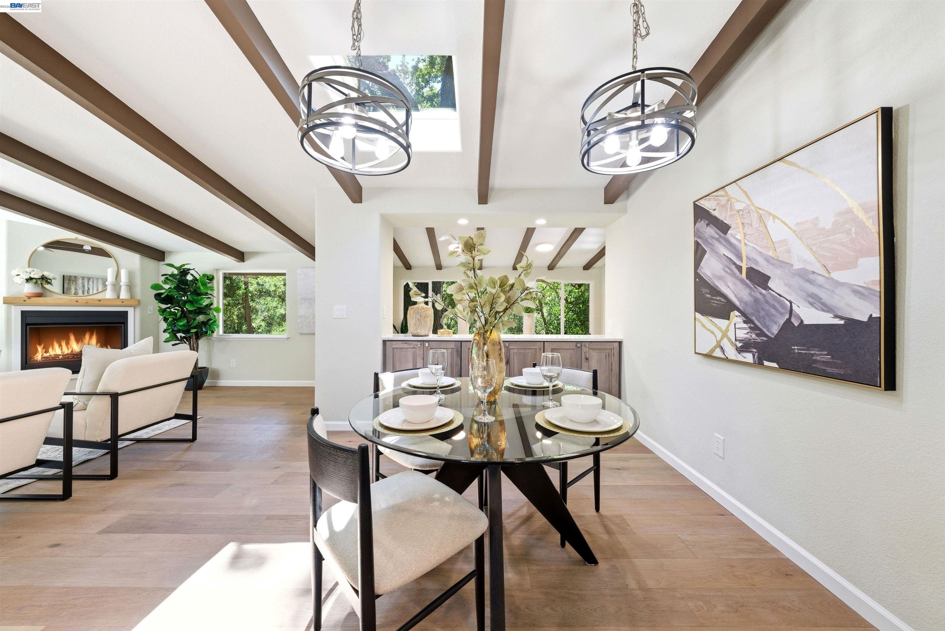 1929 Kilkare Road Sunol, CA 94586 - Photo 11 of 24 a dining room with furniture a rug a painting and a chandelier