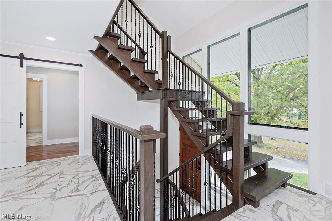 20601 Shelburne Road Shaker Heights, OH 44122 - Photo 2 of 29 Stairway leading to all three living levels.