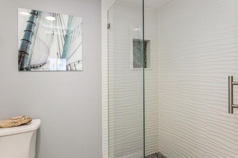100 Ocean Trail Way, Unit 1010 Jupiter, FL 33477 - Photo 17 of 40 a bathroom with a shower