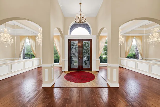 a view of a room with window and wooden floor