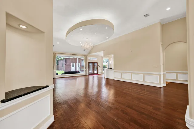 a kitchen with stainless steel appliances granite countertop a stove and a sink