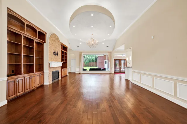 a kitchen with stainless steel appliances granite countertop a stove and a sink