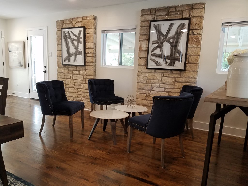 5405 Hudson Street Austin, TX 78721 - Photo 16 of 37 Hardwood floors and natural stone accents define this inviting and comfortable living space.