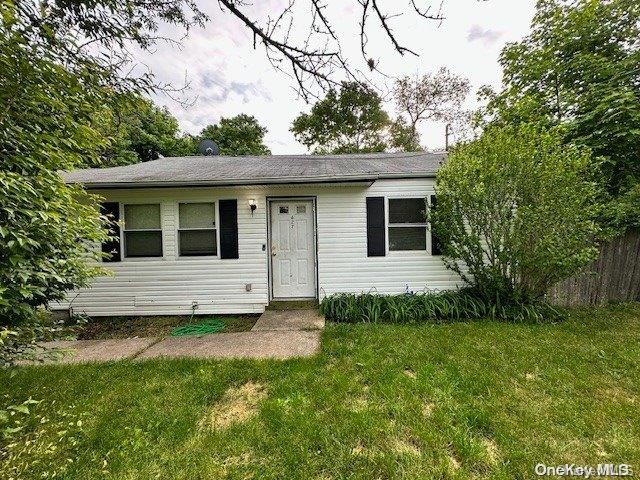 622 Post Avenue Bellport, NY 11713 - Photo 1 of 1 a view of a back yard of the house