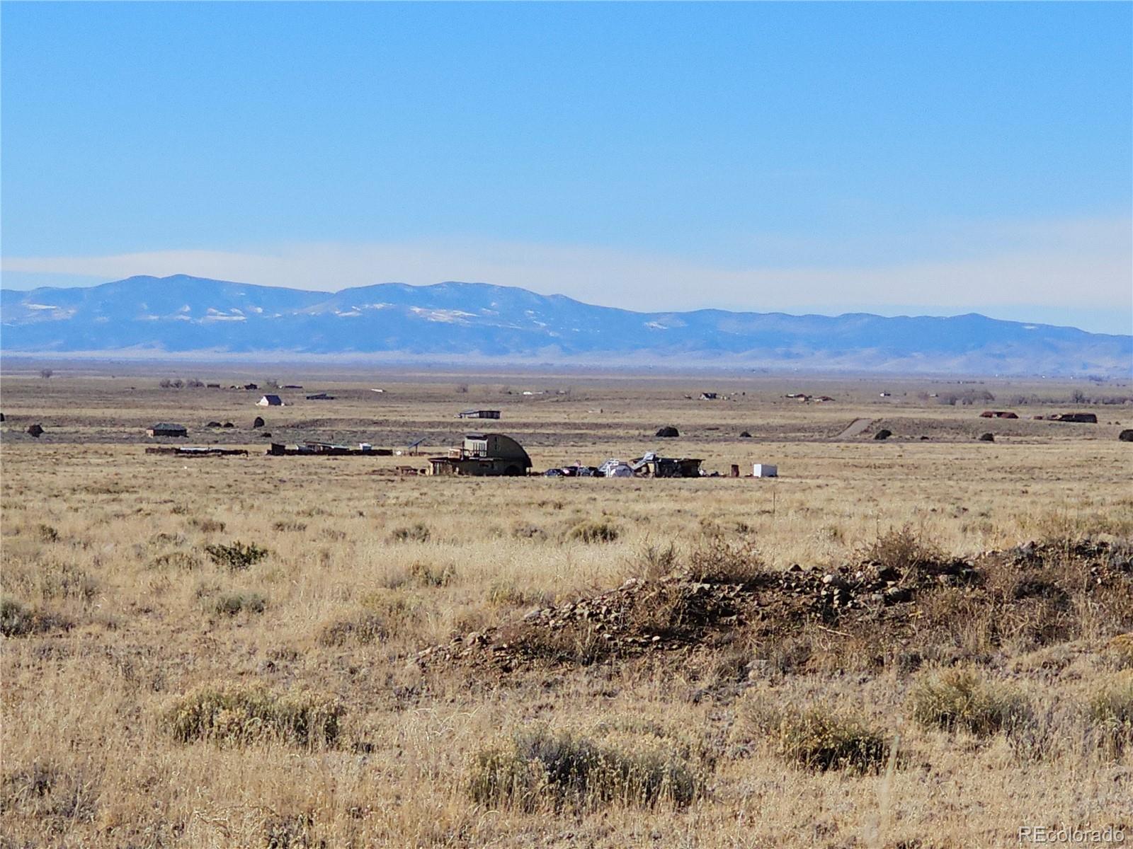 170 Wagon Wheel Road Crestone, CO 81131 - Photo 11 of 20 a view of an ocean beach and mountain