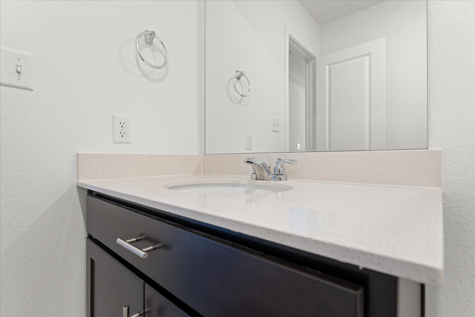 905 Powell Kyle, TX 78640 - Photo 29 of 37 a bathroom with a sink and a mirror