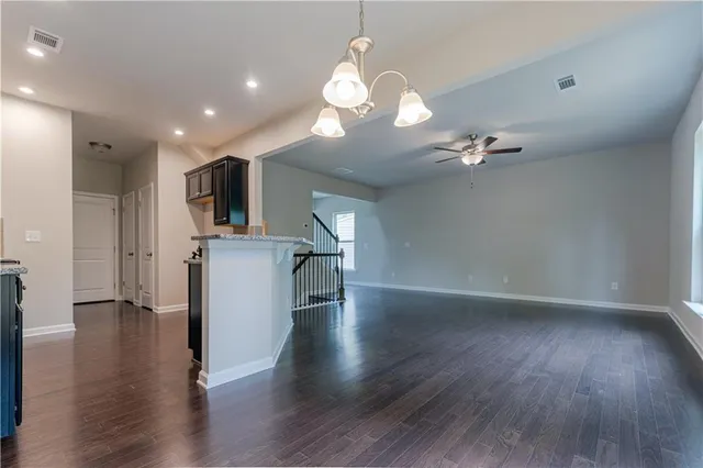 a view of a livingroom with a kitchen