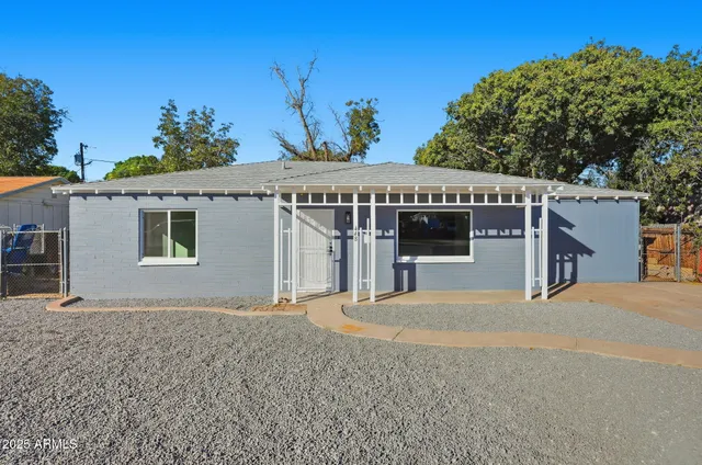 a front view of a house with a garage