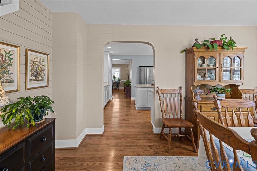 408 John Street Ashland, VA 23005 - Photo 12 of 45 a view of a hallway with wooden floor and a potted plant