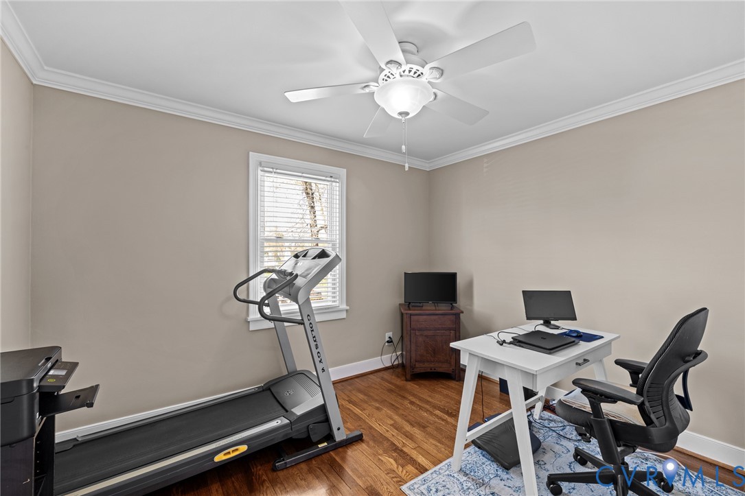 408 John Street Ashland, VA 23005 - Photo 22 of 45 a workspace with furniture and a gym cycle
