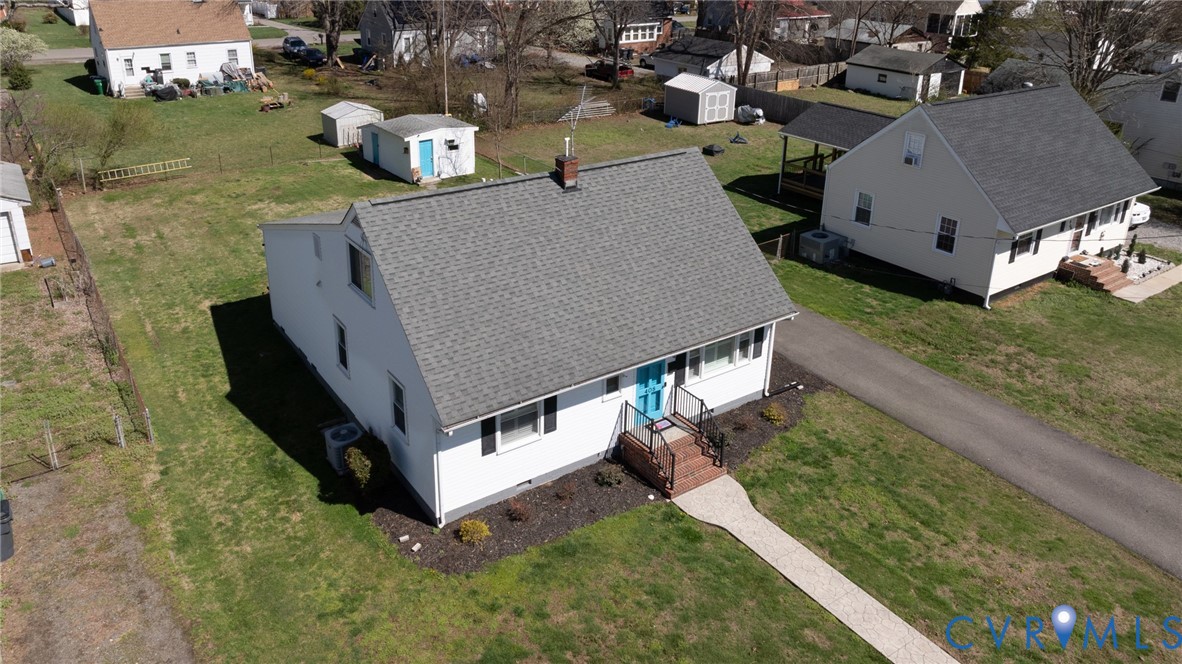 408 John Street Ashland, VA 23005 - Photo 41 of 45 an aerial view of a house with a yard basket ball court and outdoor seating