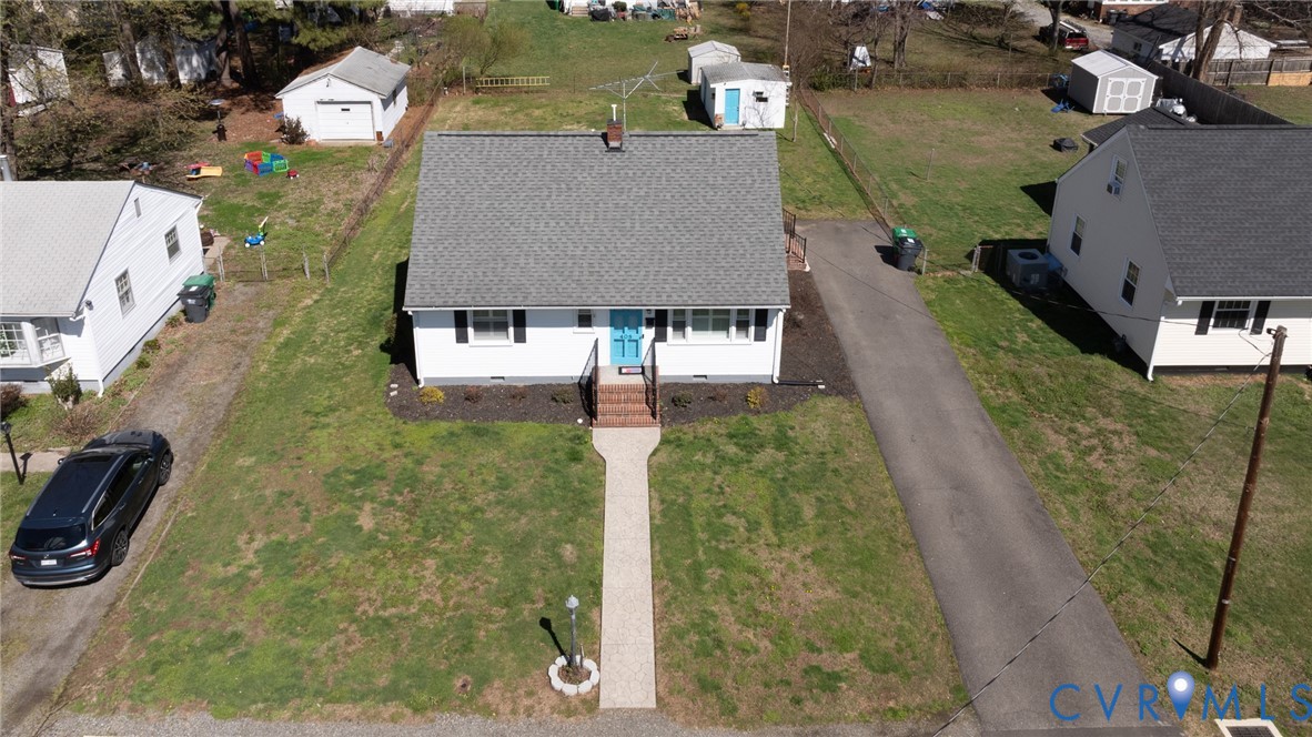 408 John Street Ashland, VA 23005 - Photo 42 of 45 an aerial view of a house with a yard and pool