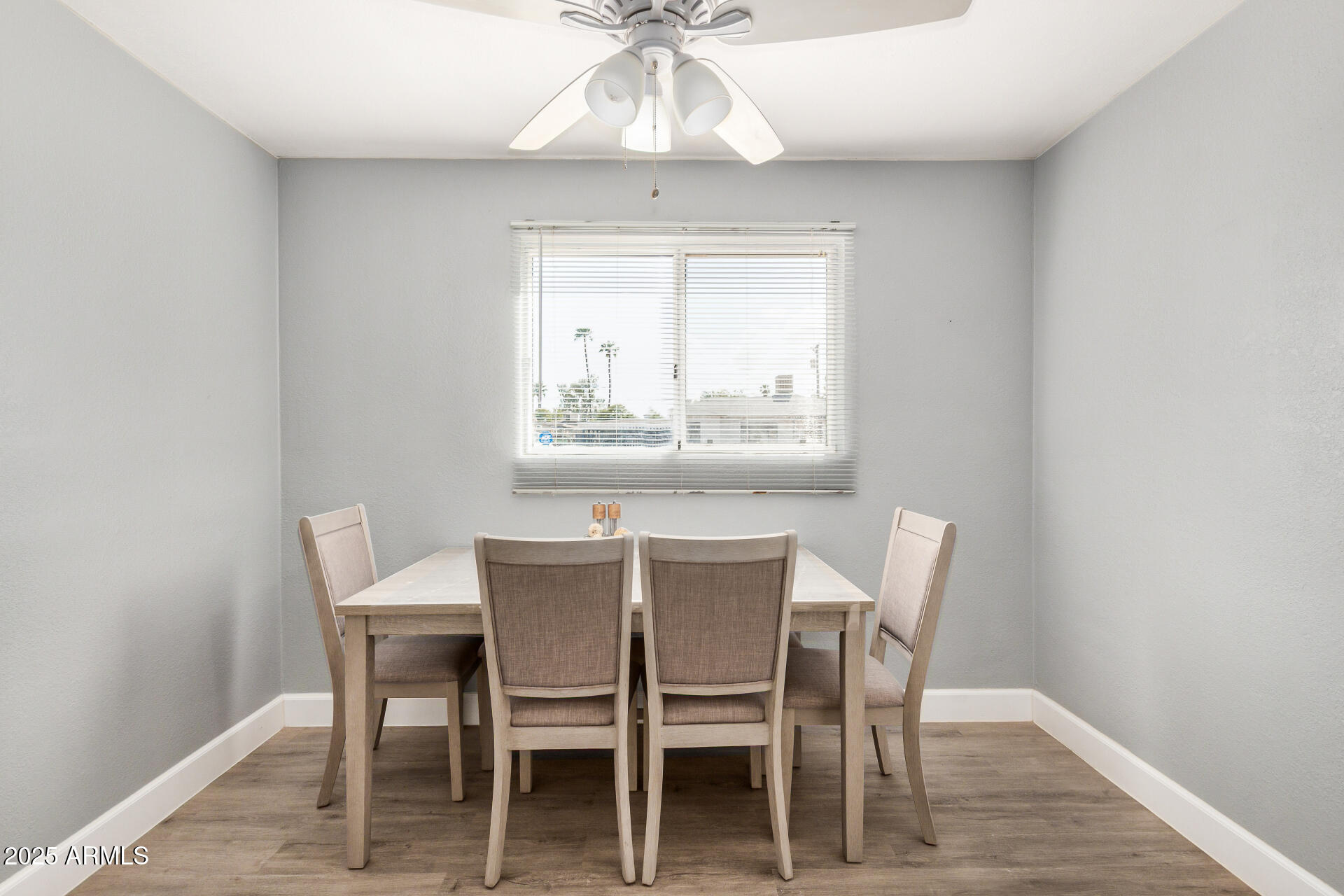 2726 West Ruth Avenue Phoenix, AZ 85051 - Photo 11 of 28 a view of a dining room with furniture window and outside view