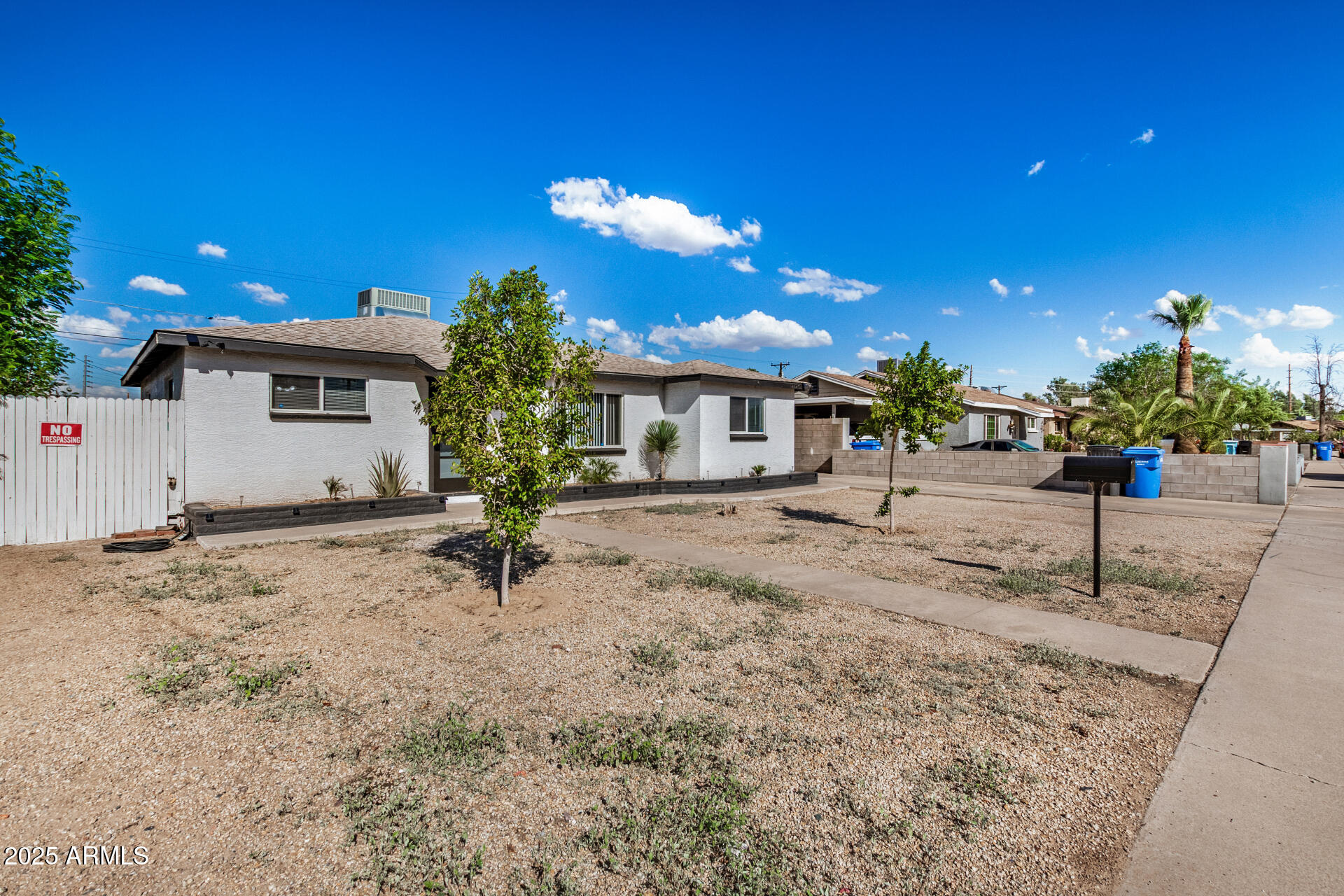 2726 West Ruth Avenue Phoenix, AZ 85051 - Photo 3 of 28 a view of a house with basketball court