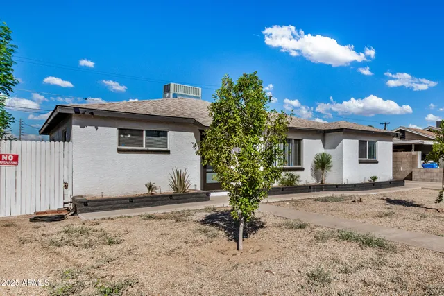 a view of a house with a patio
