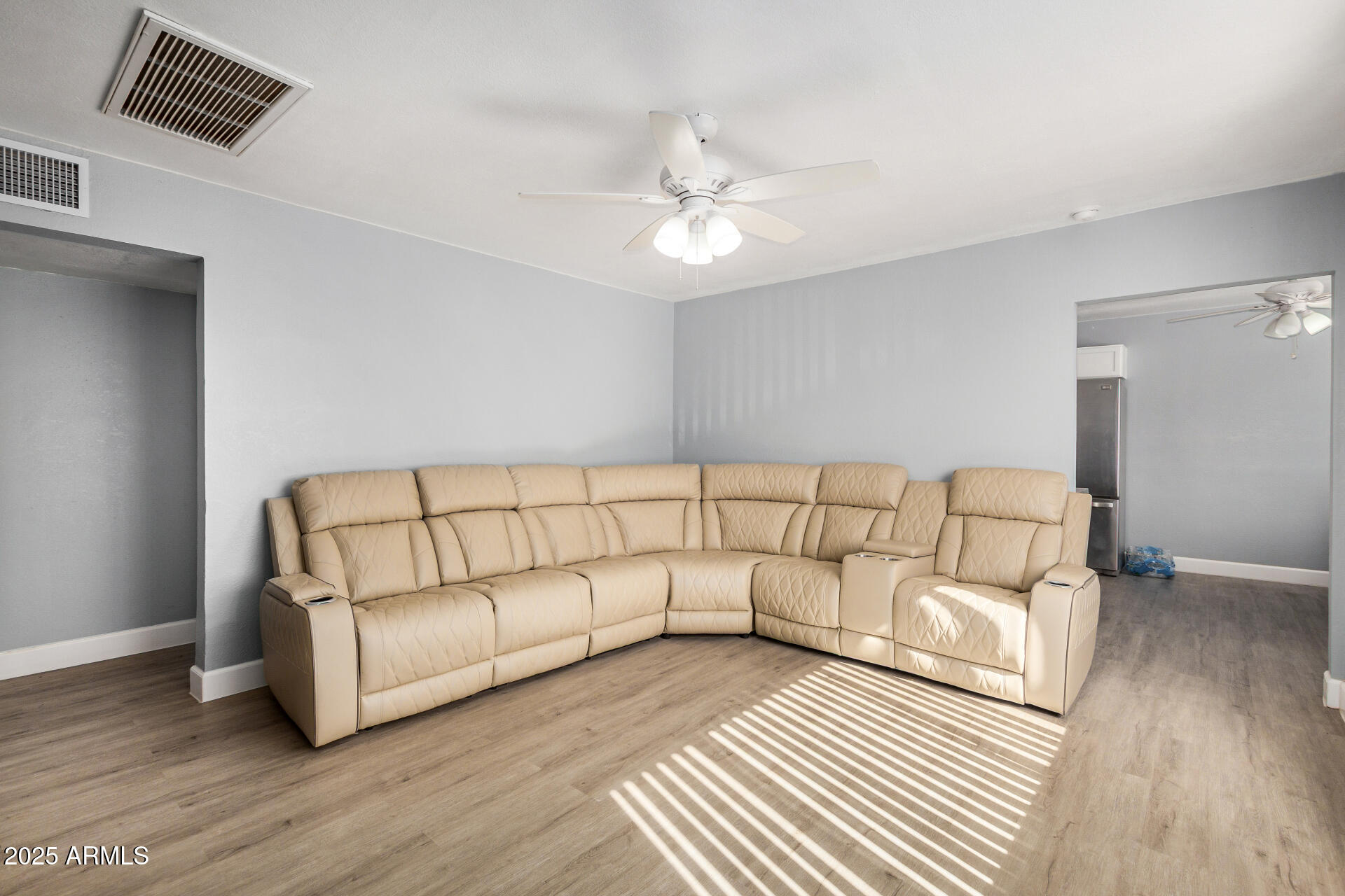 2726 West Ruth Avenue Phoenix, AZ 85051 - Photo 8 of 28 a living room with furniture and a rug