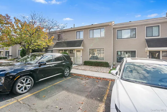 a car parked in front of a house
